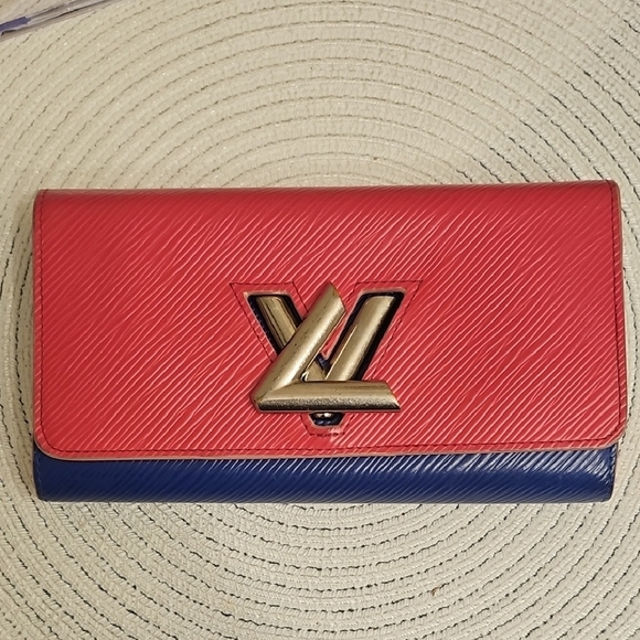Louis Vuitton Pink and Blue Twist Lock Leather Wallet - Picture 1 of 10